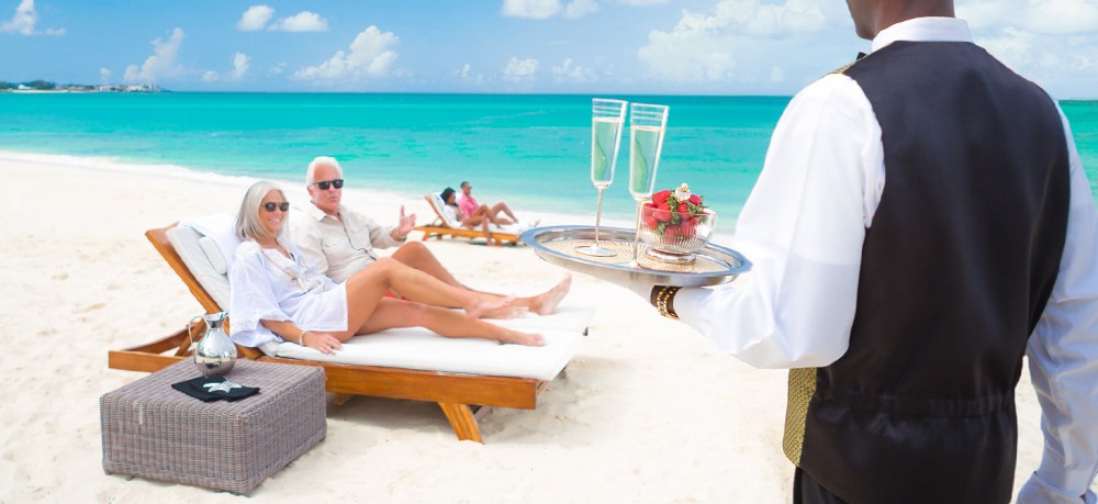 adult-couple-rest-on-beach